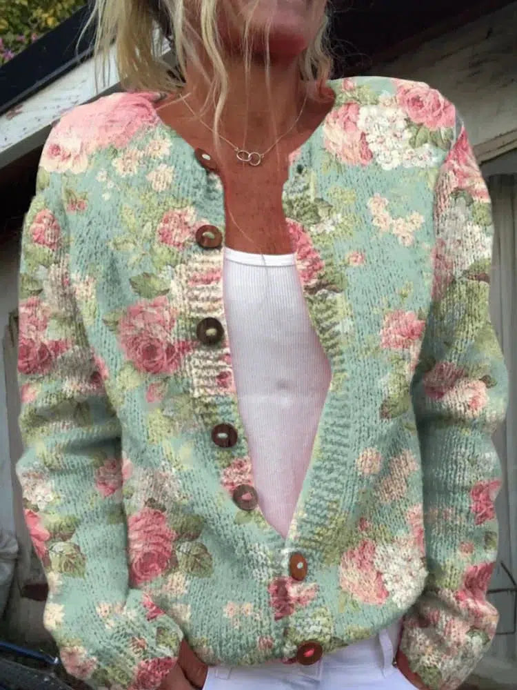 Grüne kragenlose langärmelige Strickjacke mit Blumenmuster